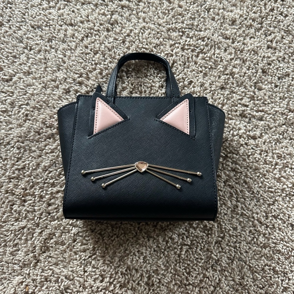 Kate Spade New York Jazz Things Up Mini Hayden black and pink cat purse.